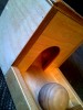Box with wooden ball